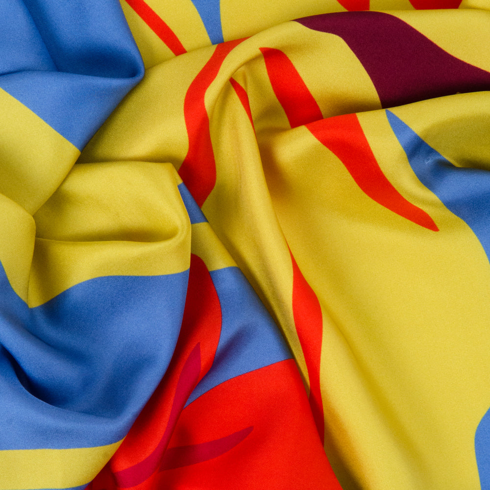 AFRICAN IRIS SCARF IN YELLOW OCHRE, BLOOD RED, CORNFLOWER BLUE, AND BLACK