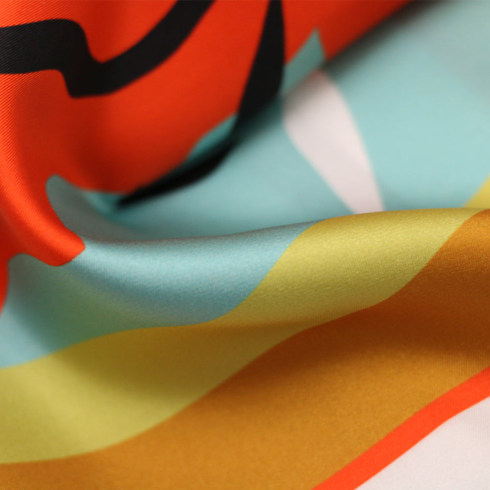 YURI SCARF IN TURQUOISE, WHITE, BLOOD ORANGE AND BLACK